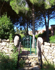 gate leading to pathway to private beach